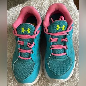 Size 8 but fits more like a 7.5. Under Armour multi color sneakers.